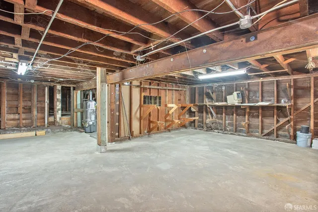 a view of a room with wooden ceiling