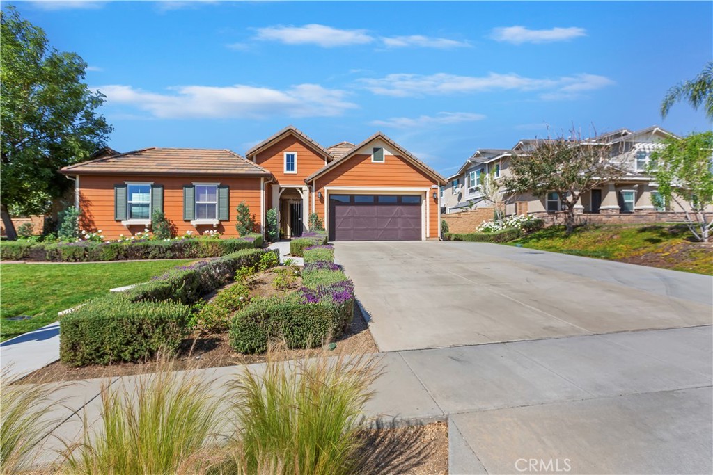 6336 Sloane Court Rancho Cucamonga, CA 91739 - Photo 1 of 69 a front view of a house with a yard