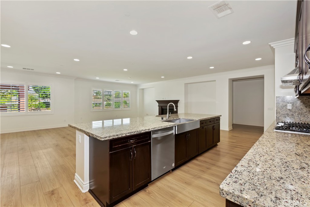 6336 Sloane Court Rancho Cucamonga, CA 91739 - Photo 23 of 69 a kitchen with a stove and a sink