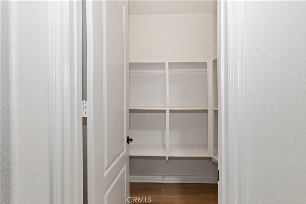6336 Sloane Court Rancho Cucamonga, CA 91739 - Photo 26 of 69 a view of an empty walk in closet