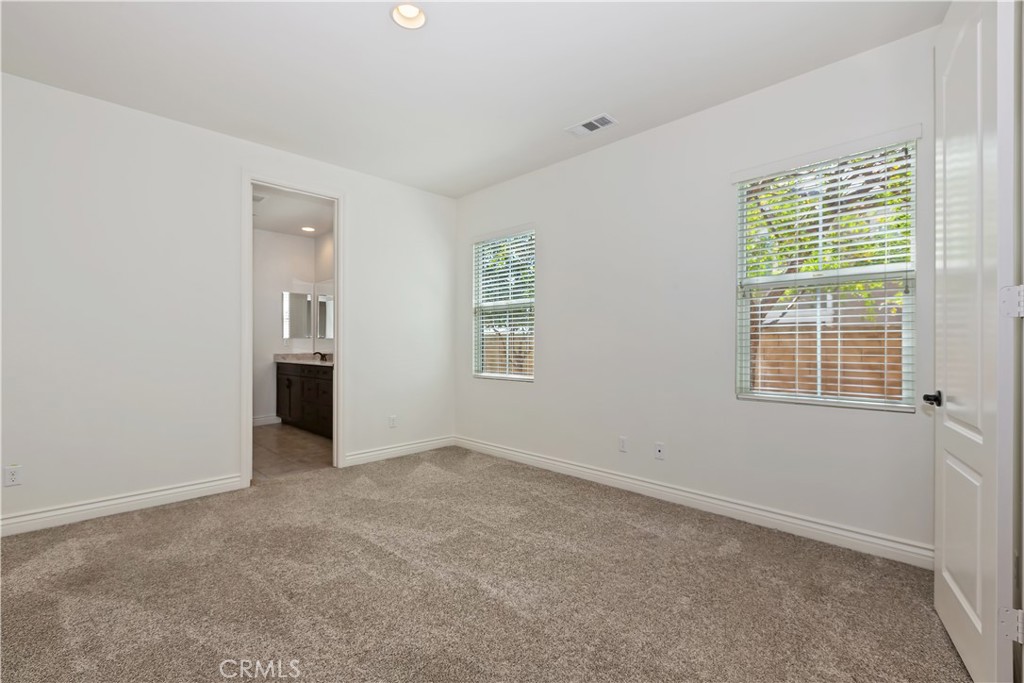6336 Sloane Court Rancho Cucamonga, CA 91739 - Photo 34 of 69 an empty room with windows