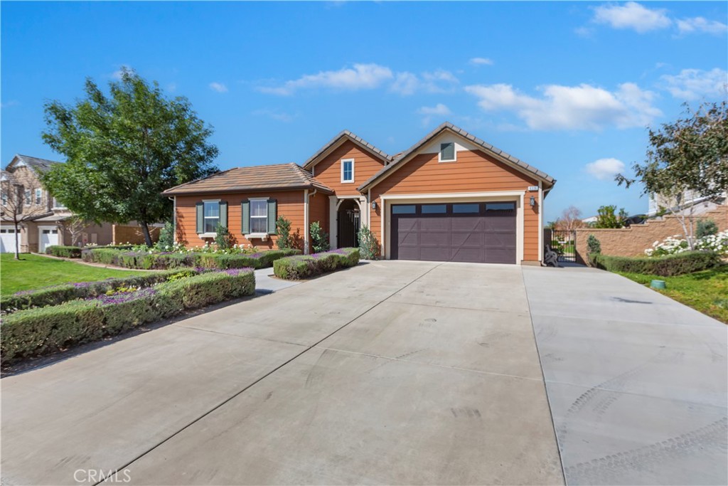 6336 Sloane Court Rancho Cucamonga, CA 91739 - Photo 4 of 69 front view of house with a yard