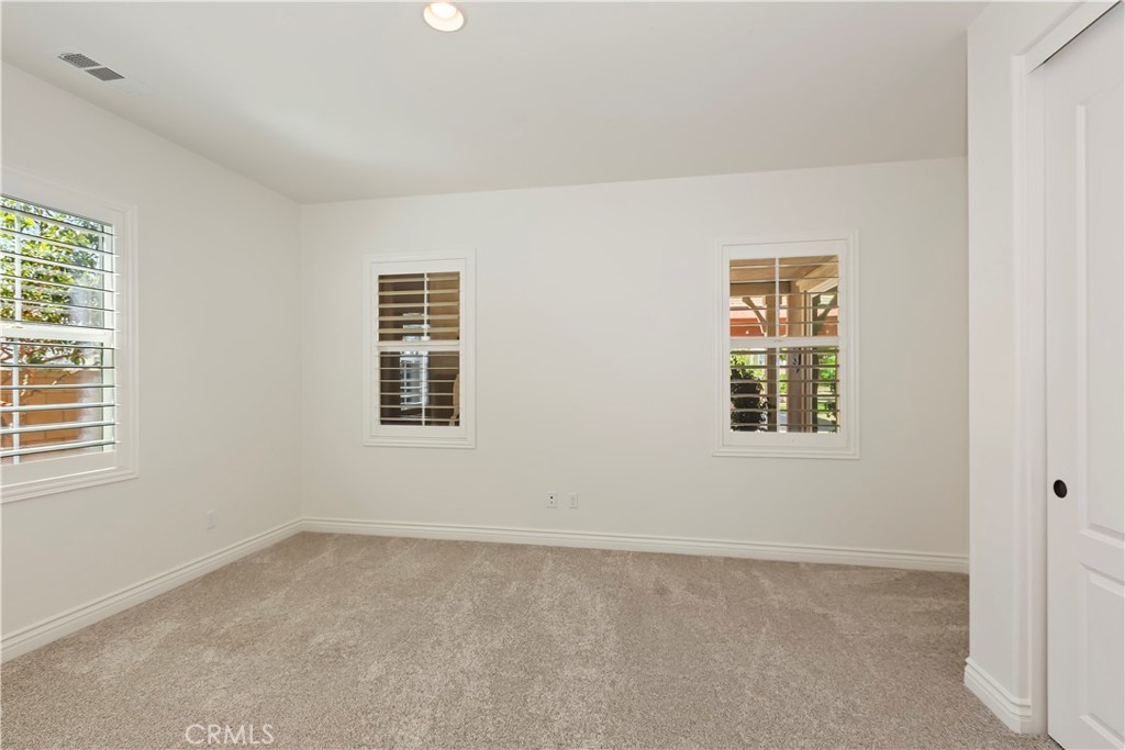 6336 Sloane Court Rancho Cucamonga, CA 91739 - Photo 41 of 69 an empty room with windows