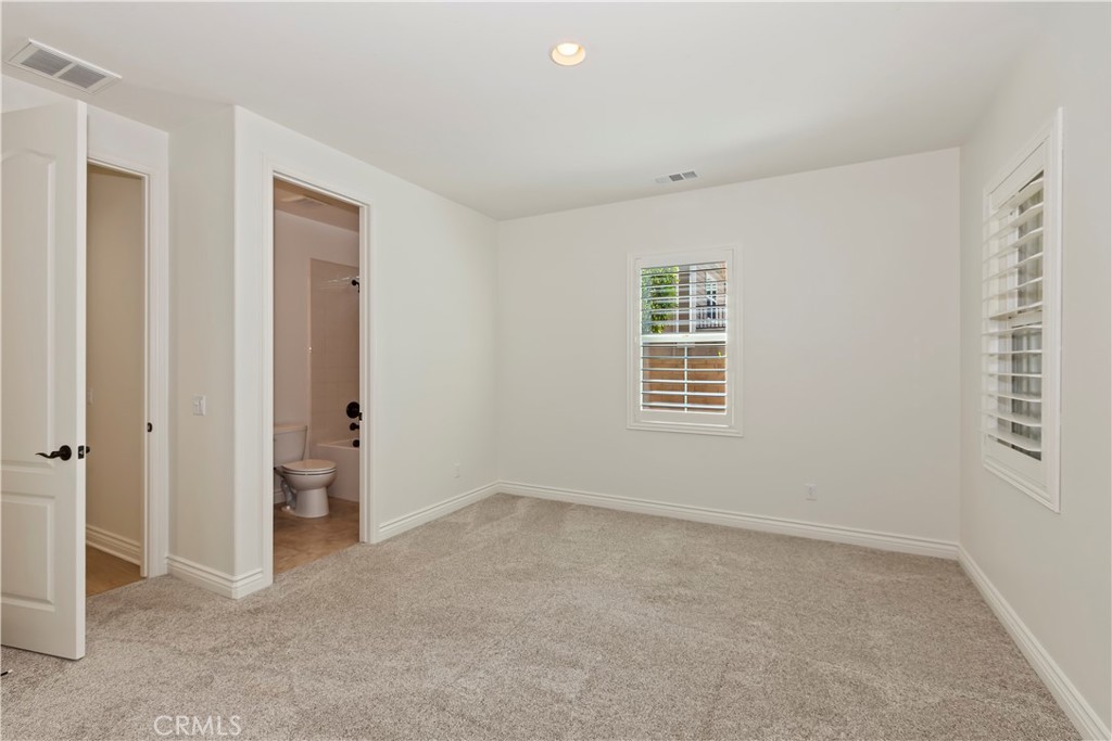 6336 Sloane Court Rancho Cucamonga, CA 91739 - Photo 42 of 69 an empty room with windows
