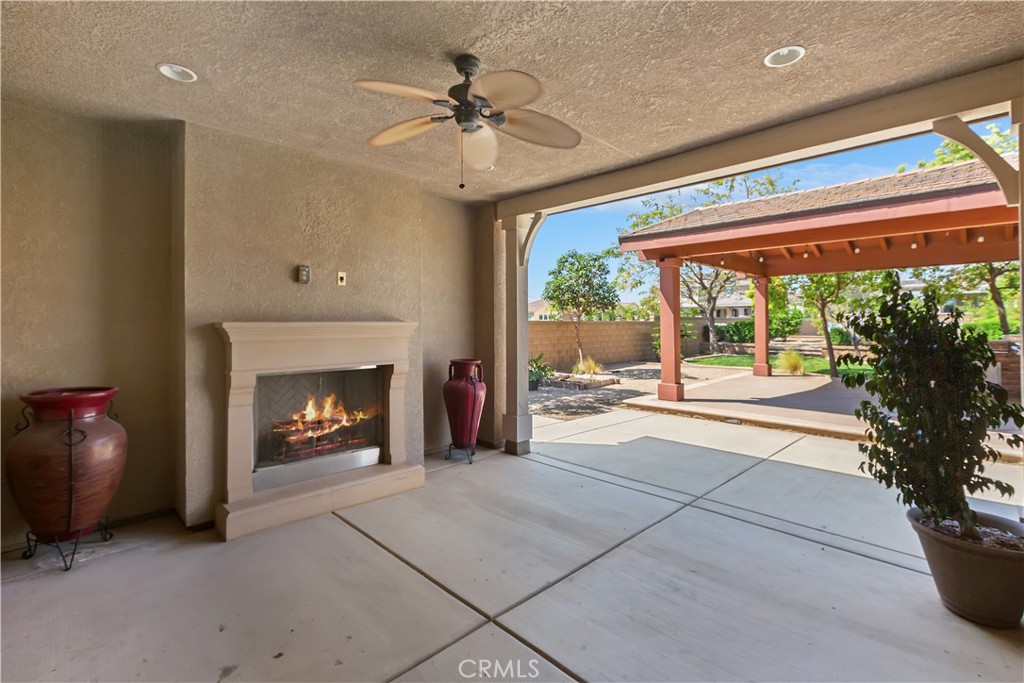 6336 Sloane Court Rancho Cucamonga, CA 91739 - Photo 48 of 69 a living room with furniture and a fireplace
