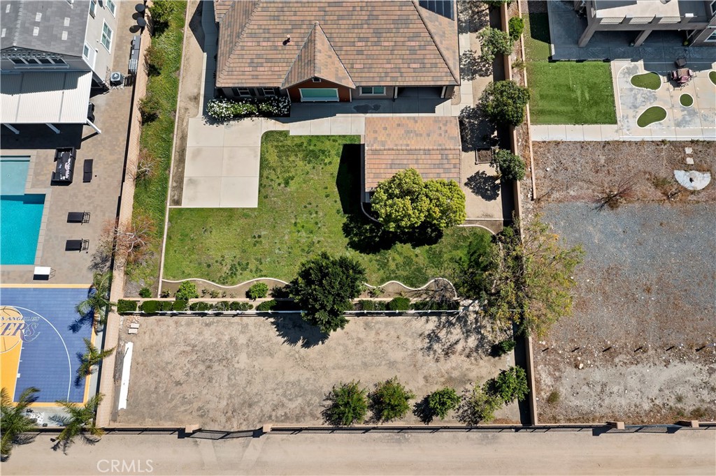 6336 Sloane Court Rancho Cucamonga, CA 91739 - Photo 61 of 69 an aerial view of a house with a yard