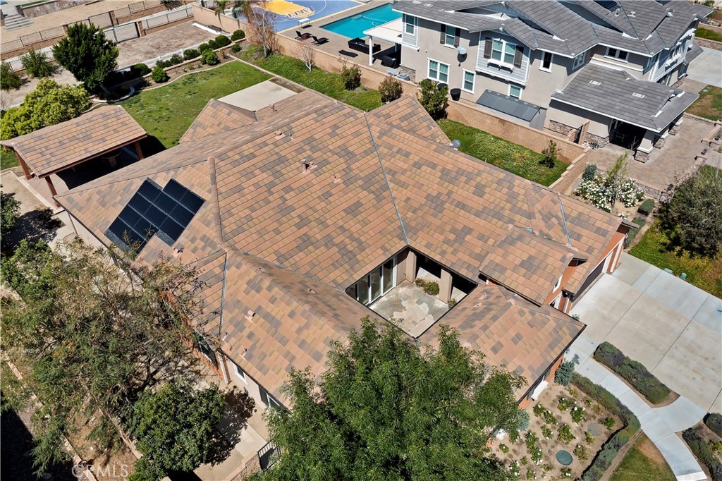 6336 Sloane Court Rancho Cucamonga, CA 91739 - Photo 63 of 69 an aerial view of a house with a yard