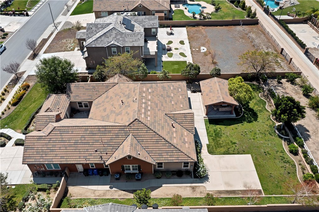 6336 Sloane Court Rancho Cucamonga, CA 91739 - Photo 67 of 69 an aerial view of a house with a yard