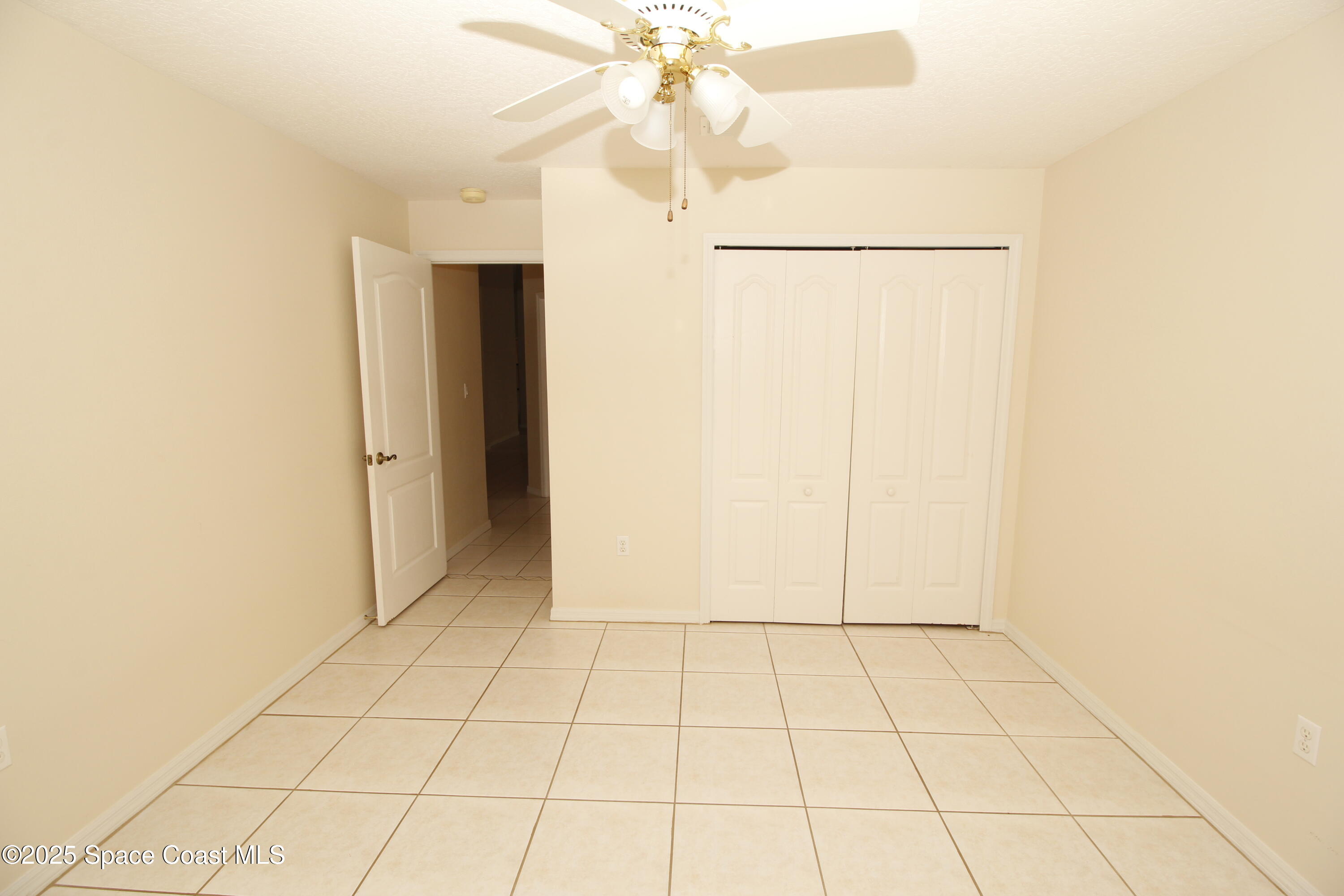 7971 Daventry Drive Melbourne, FL 32940 - Photo 3 of 22 a view of an empty room