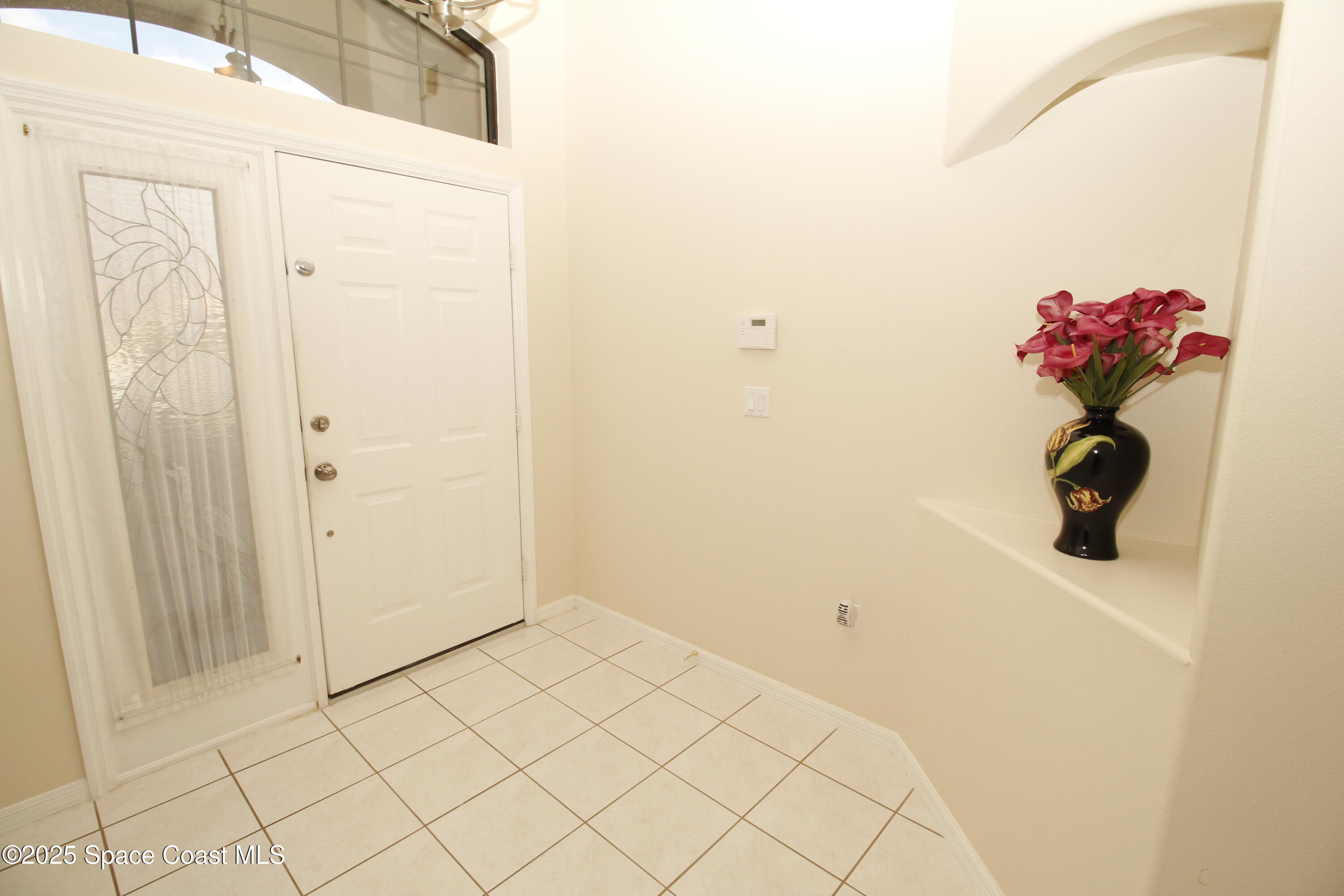 7971 Daventry Drive Melbourne, FL 32940 - Photo 7 of 22 a view of a storage & utility room