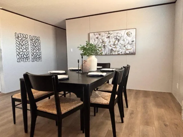 a view of a dining room with furniture