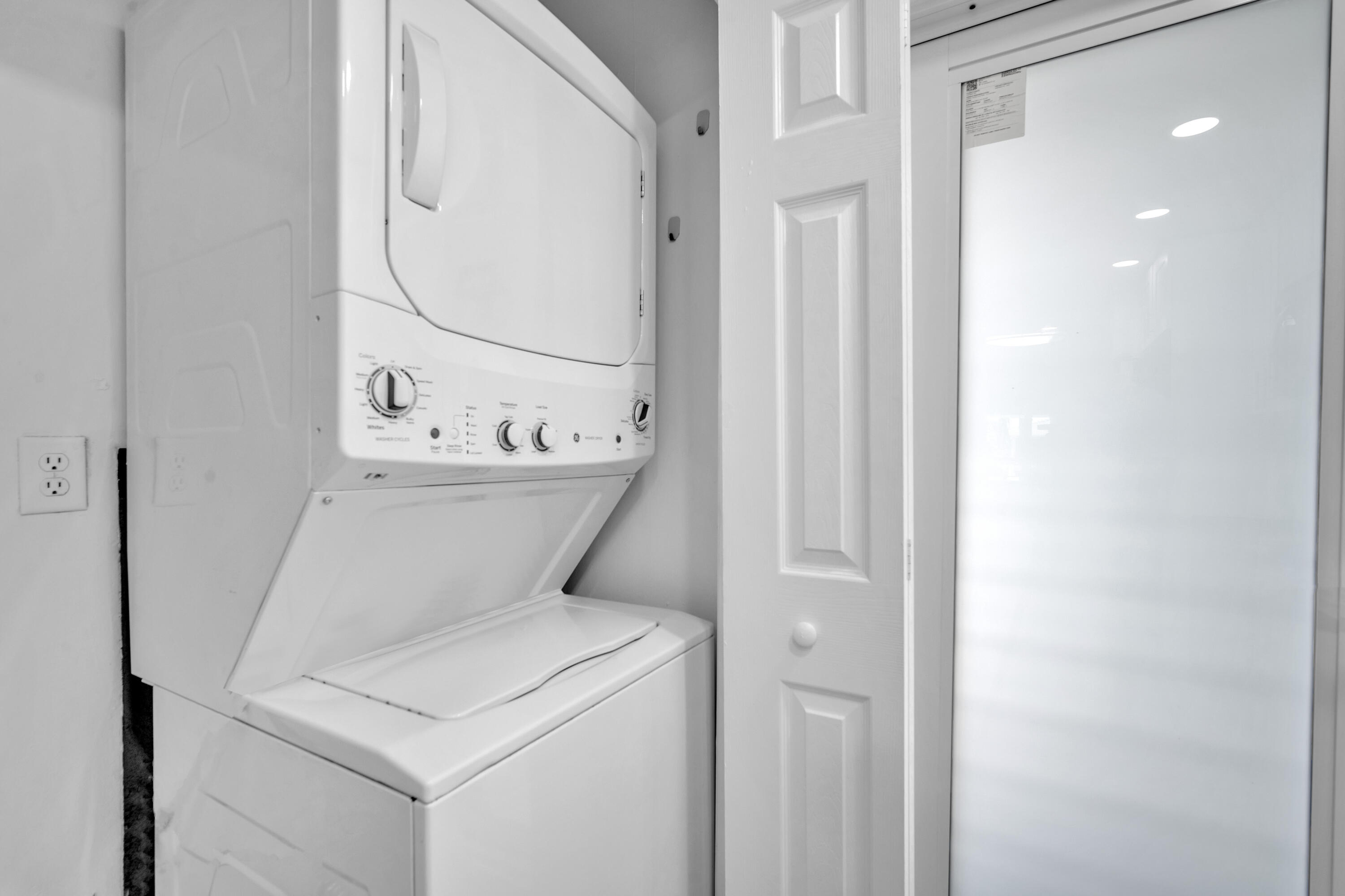 1015 Spanish River Road Boca Raton, FL 33432 - Photo 11 of 28 a utility room with dryer and washer