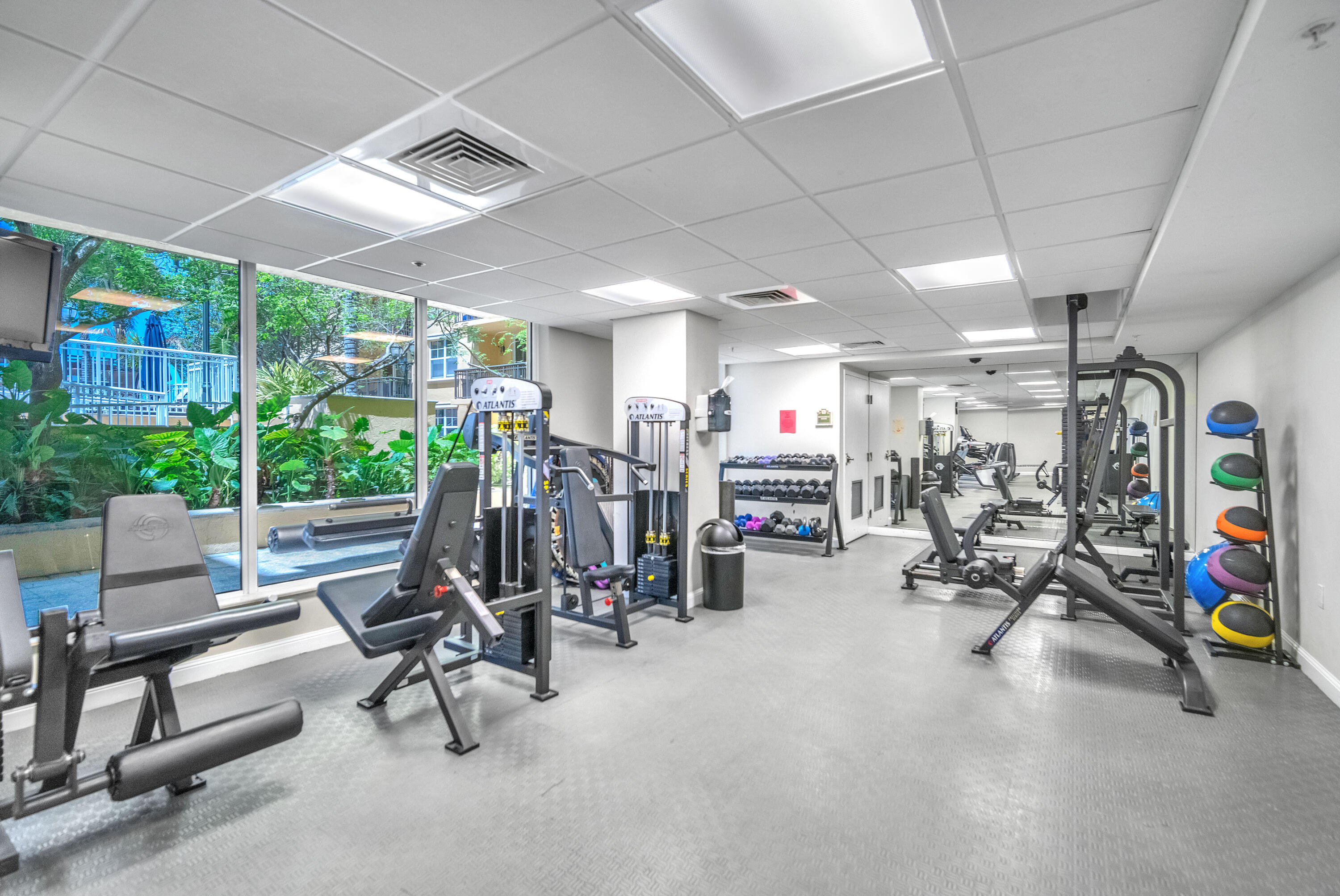 1015 Spanish River Road Boca Raton, FL 33432 - Photo 28 of 28 a view of a room with gym equipment