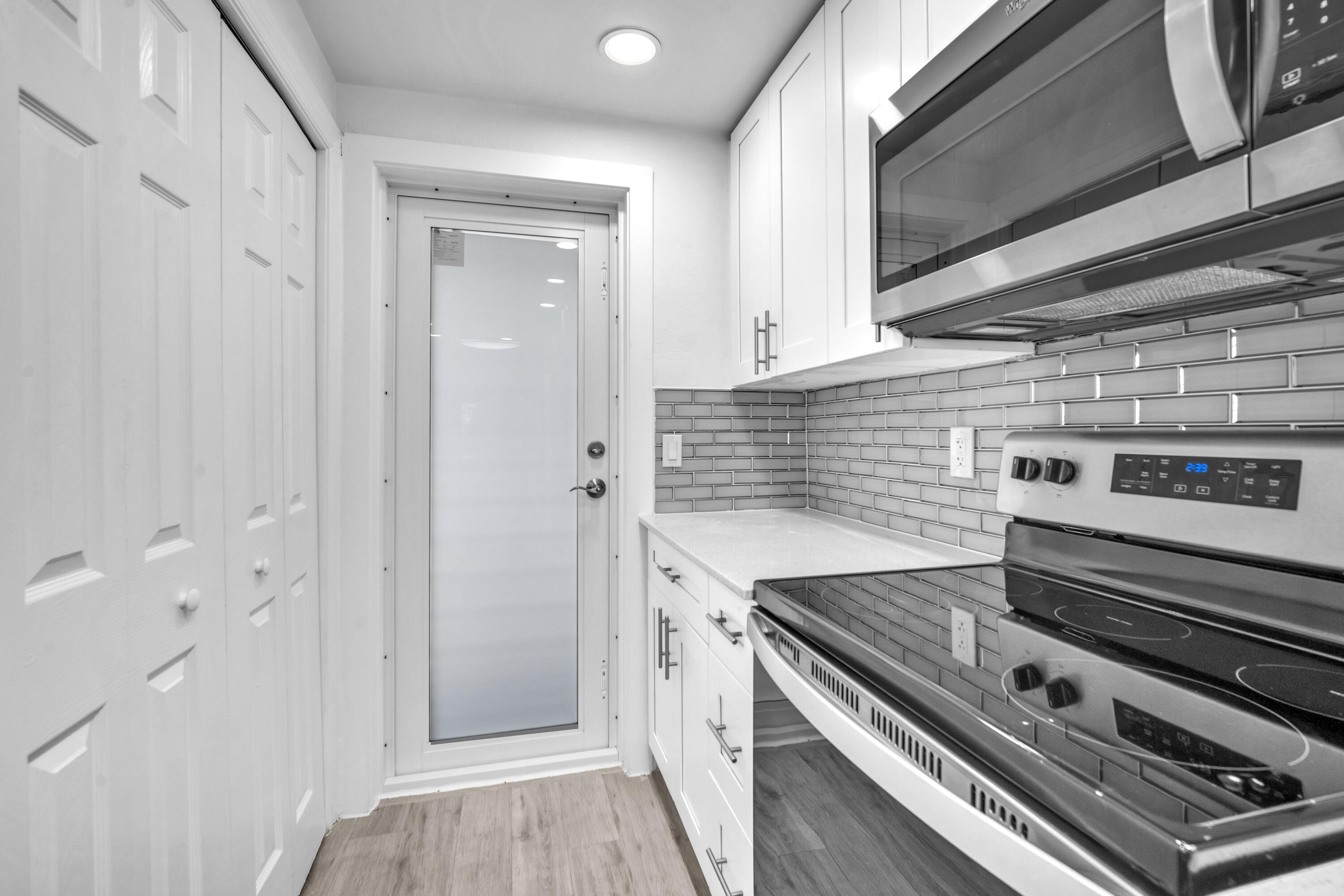 1015 Spanish River Road Boca Raton, FL 33432 - Photo 10 of 28 a view of stove top oven