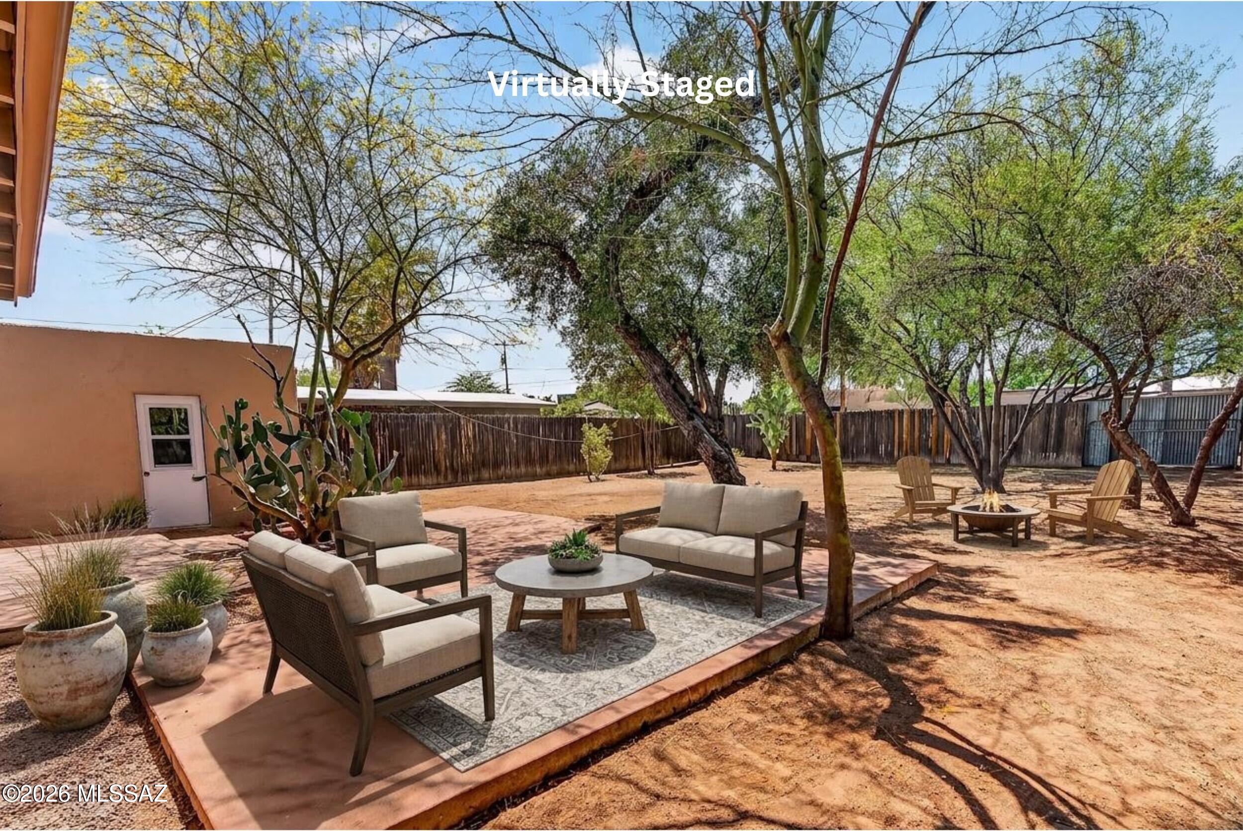 1412 East Spring Street Tucson, AZ 85719 - Photo 7 of 43 a view of a backyard with a patio