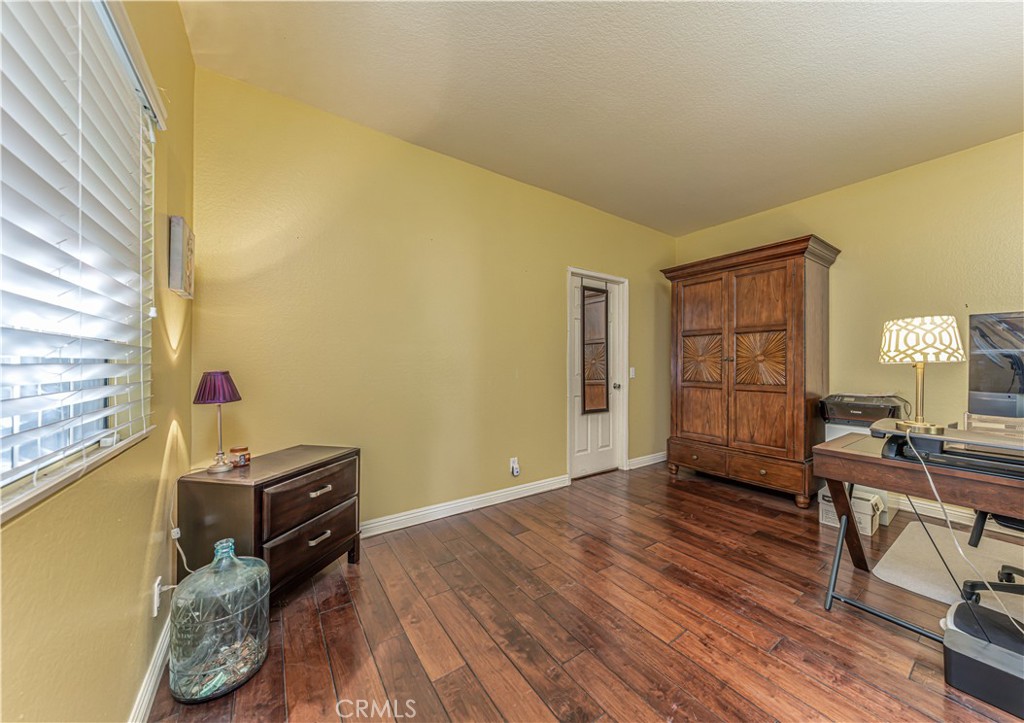 3730 South Bear Street, Unit E Santa Ana, CA 92704 - Photo 14 of 43 a view of workspace with wooden floor