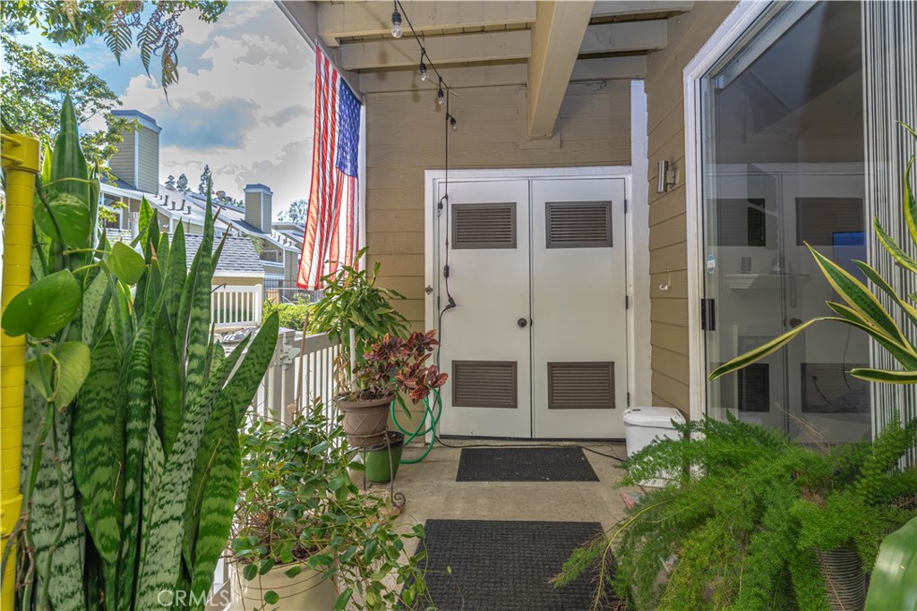 3730 South Bear Street, Unit E Santa Ana, CA 92704 - Photo 18 of 43 a view of a back yard of the house