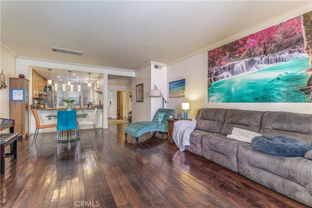 3730 South Bear Street, Unit E Santa Ana, CA 92704 - Photo 32 of 43 a living room with furniture and a large window