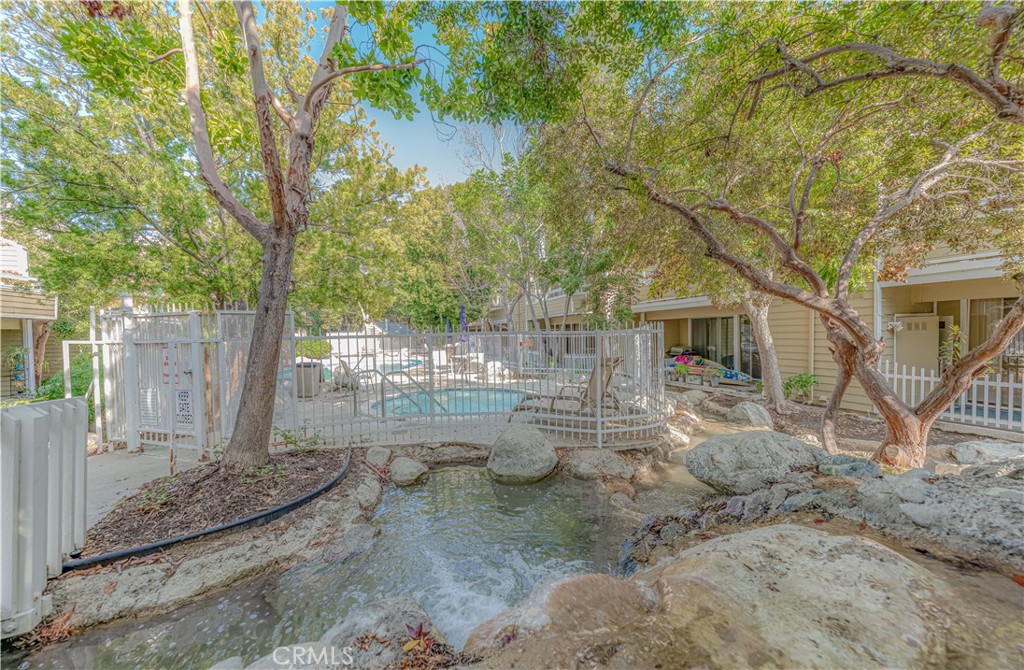 3730 South Bear Street, Unit E Santa Ana, CA 92704 - Photo 36 of 43 a view of a house with backyard