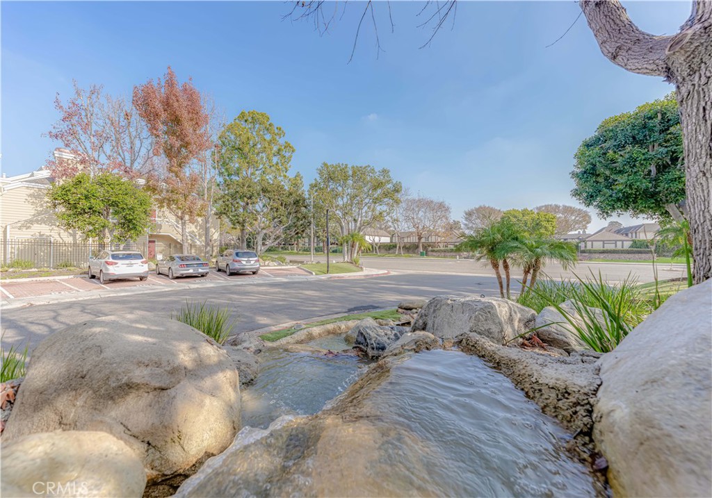3730 South Bear Street, Unit E Santa Ana, CA 92704 - Photo 37 of 43 a view of a yard in front of a house