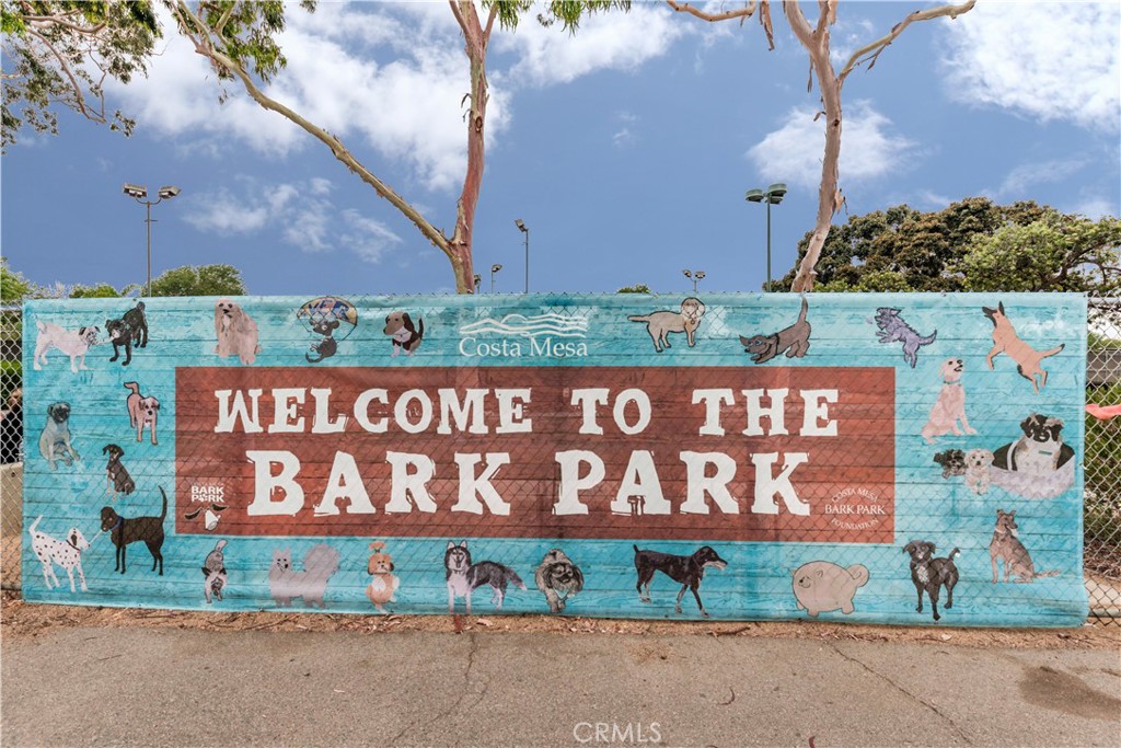 3730 South Bear Street, Unit E Santa Ana, CA 92704 - Photo 41 of 43 a street sign on the side of building