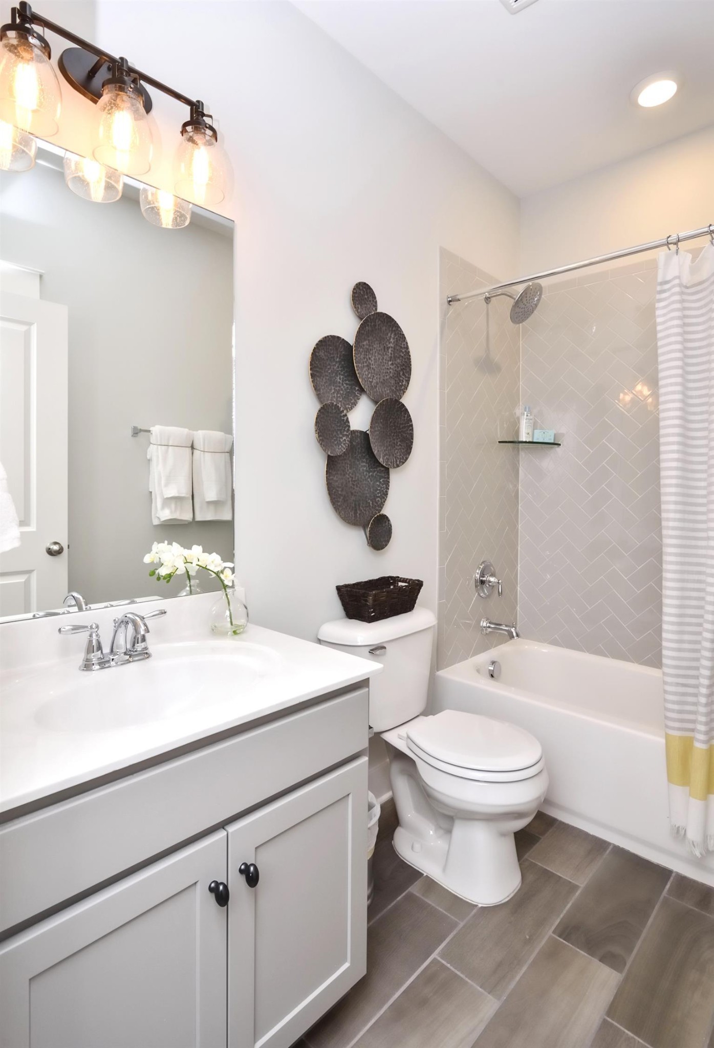 72 Remington Road Lebanon, TN 37090 - Photo 18 of 26 a bathroom with a sink a toilet and a mirror