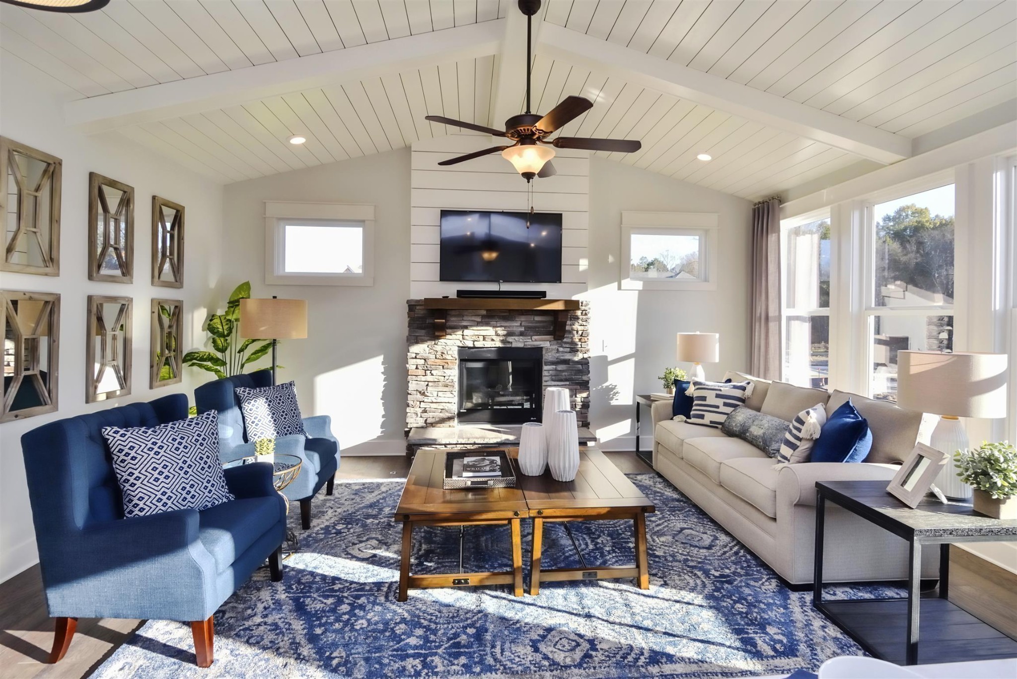 72 Remington Road Lebanon, TN 37090 - Photo 23 of 26 a living room with furniture a flat screen tv and a fireplace