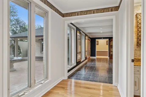 a view of a swimming pool with an outdoor space and seating area