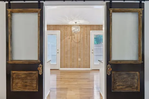 a view of a field with a tree