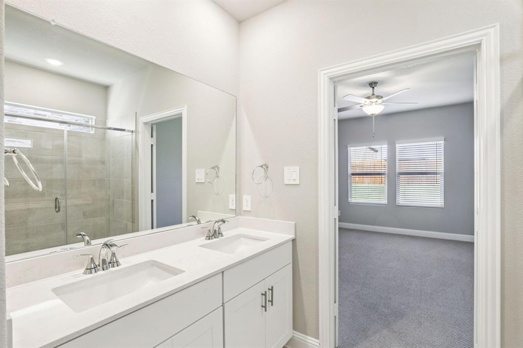 1636 Arches Road Anna, TX 75409 - Photo 15 of 22 a bathroom with a sink double vanity and a mirror
