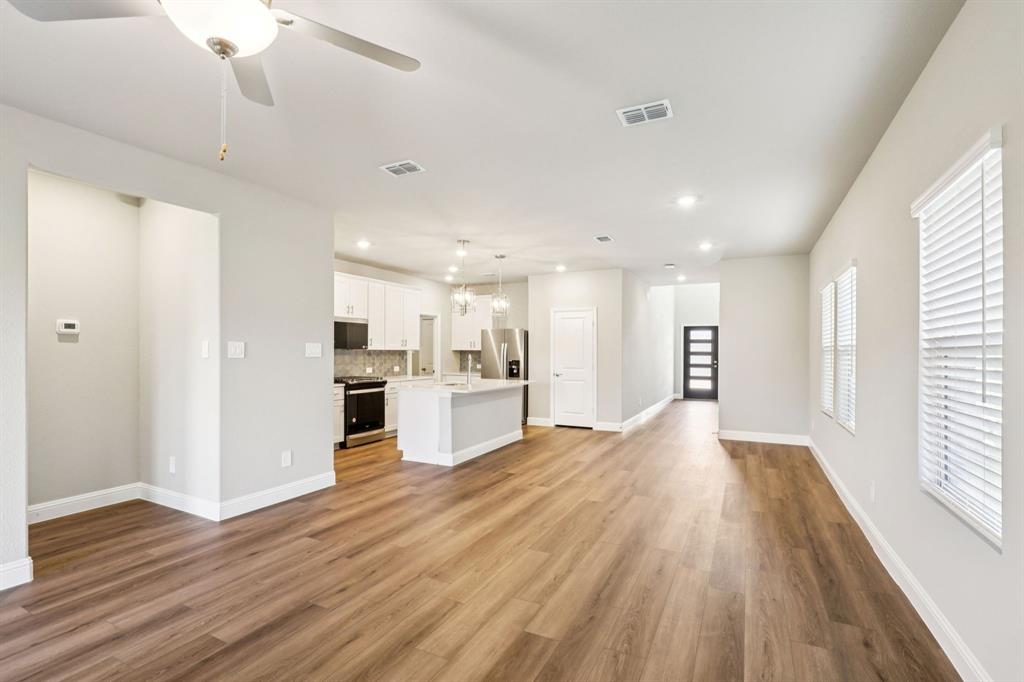 1636 Arches Road Anna, TX 75409 - Photo 7 of 22 a view of kitchen with wooden floor