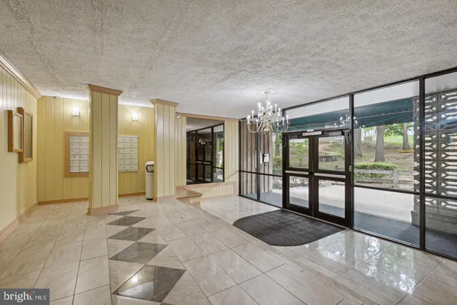 a bathroom with a tub shower and sink