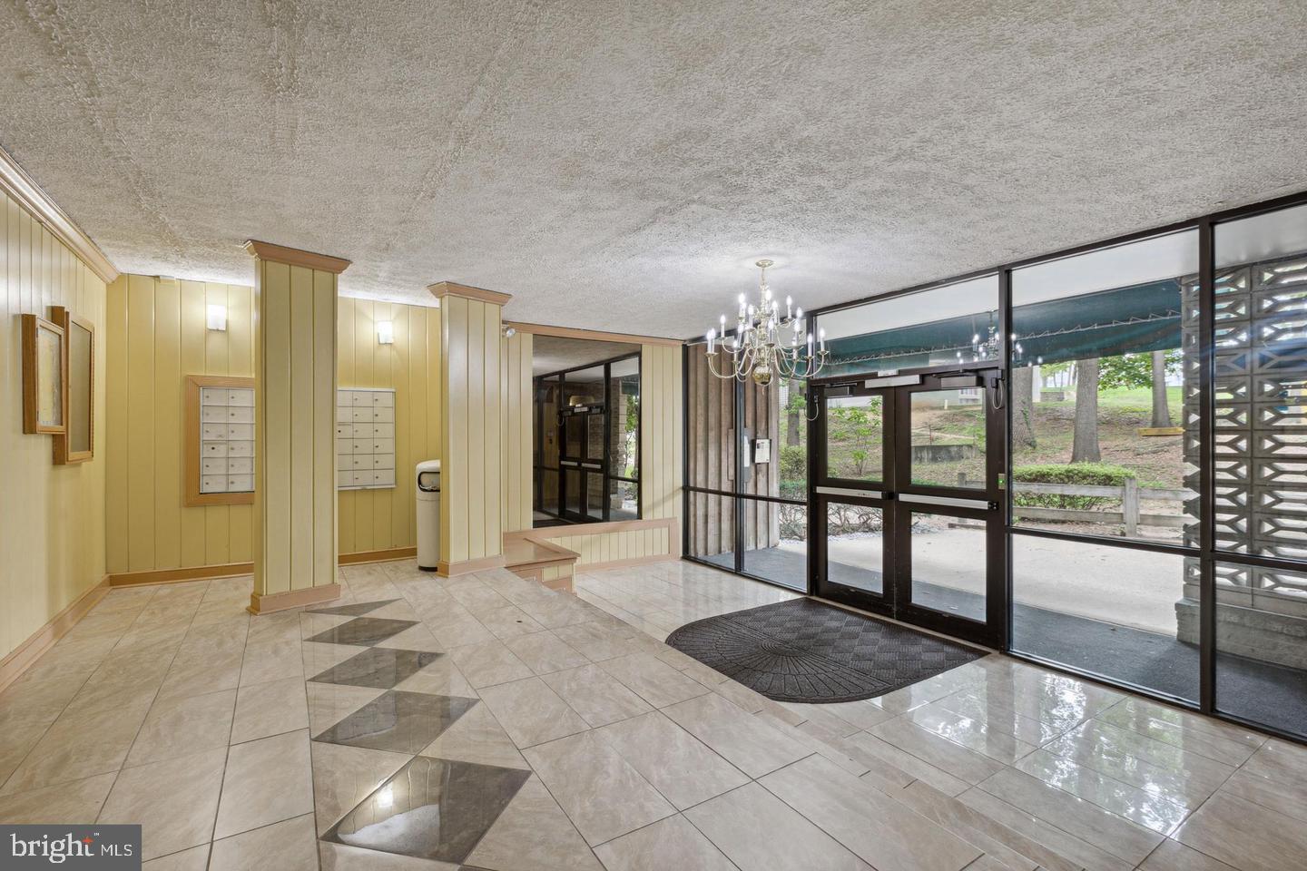 1804 Metzerott Road, Unit 303 Hyattsville, MD 20783 - Photo 2 of 13 a bathroom with a tub shower and sink