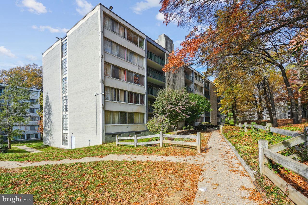 1804 Metzerott Road, Unit 303 Hyattsville, MD 20783 - Photo 10 of 13 a view of a house with a swimming pool
