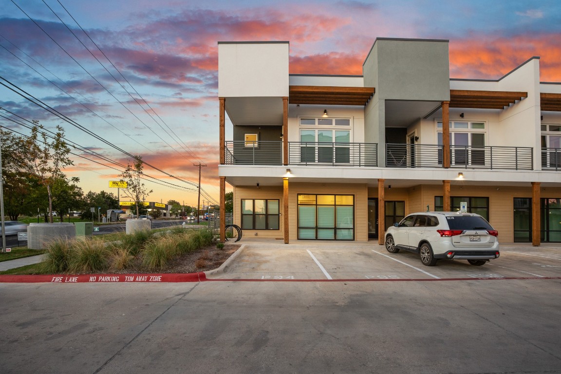 a car parked in front of a building
