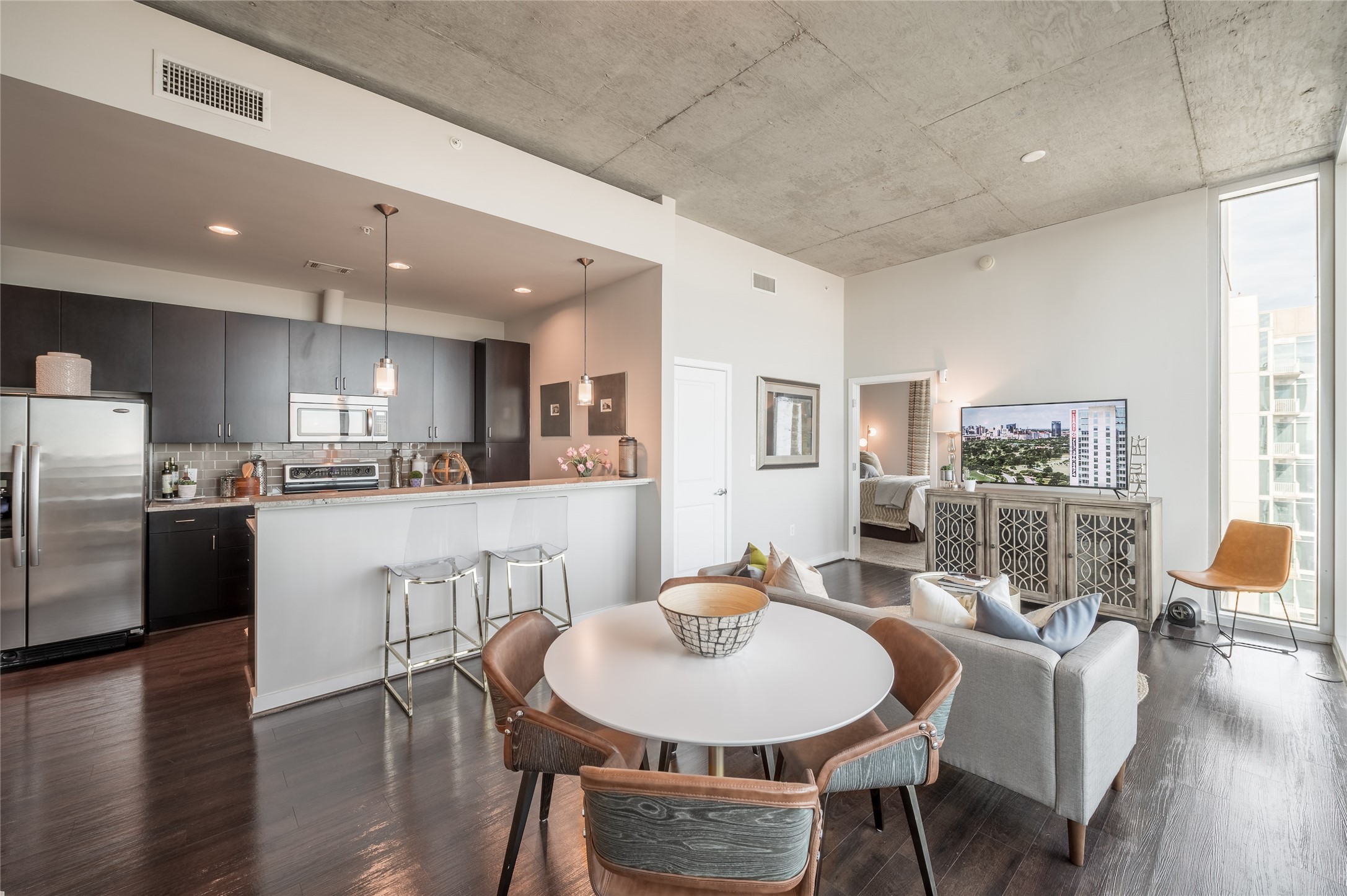 5927 Almeda Road, Unit 20814 Houston, TX 77004 - Photo 2 of 9 The seamless flow between the living, dining, and kitchen areas makes everyday living feel effortless and connected.