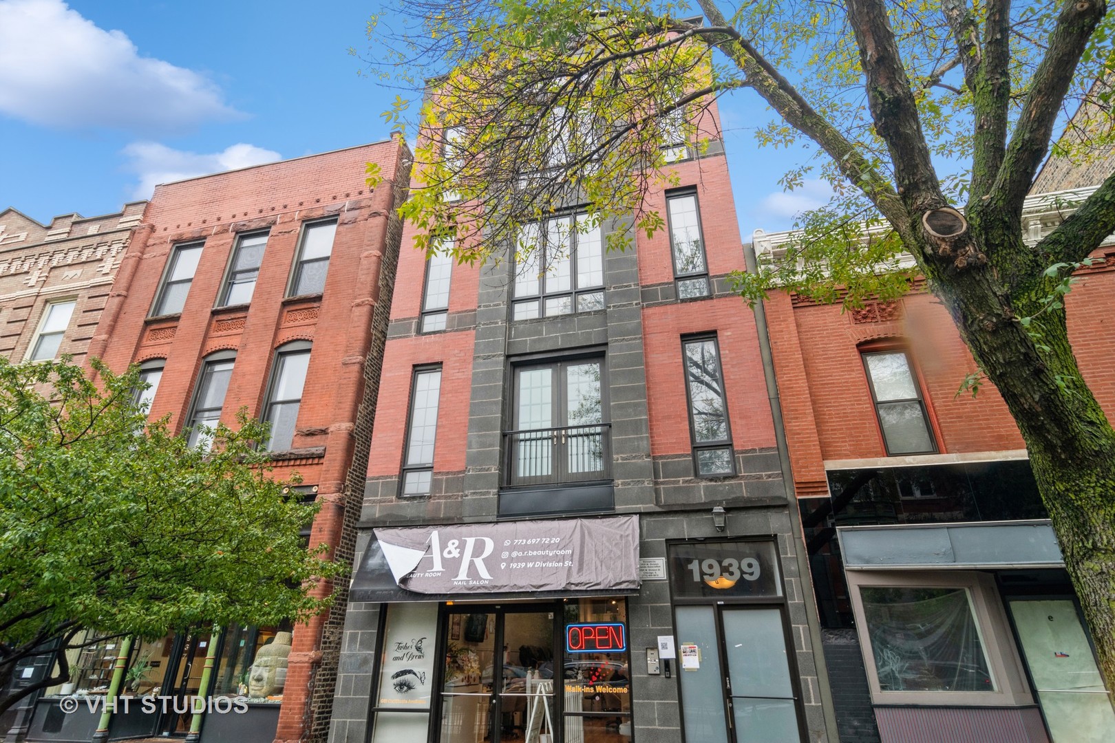 a front view of a multi story residential apartment building