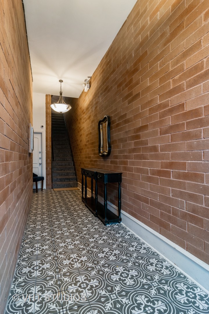 1939 West Division Street, Unit R2 Chicago, IL 60622 - Photo 2 of 18 a view of a pathway