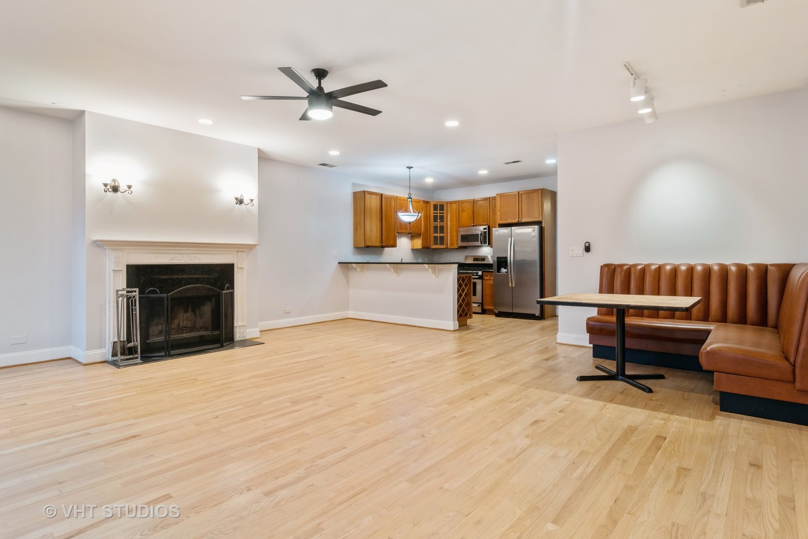 1939 West Division Street, Unit R2 Chicago, IL 60622 - Photo 4 of 18 a living room with furniture and a fireplace