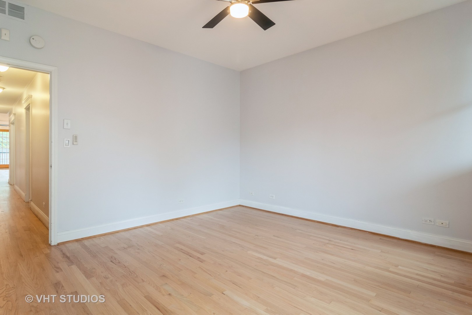 1939 West Division Street, Unit R2 Chicago, IL 60622 - Photo 9 of 18 an empty room with ceiling fan and window