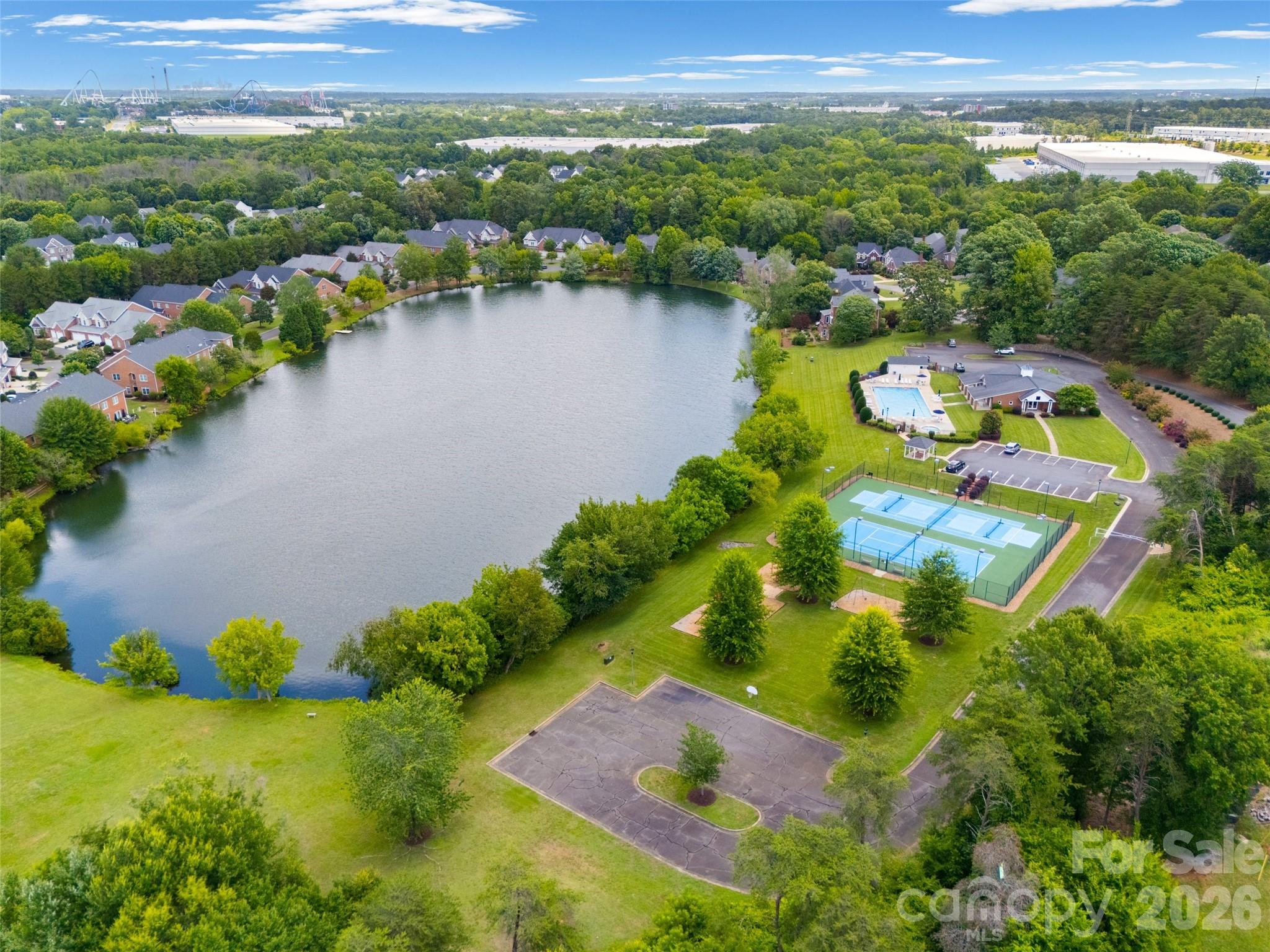 636 Landsdowne Court Fort Mill, SC 29708 - Photo 42 of 48 an aerial view of residential houses with outdoor space and lake view