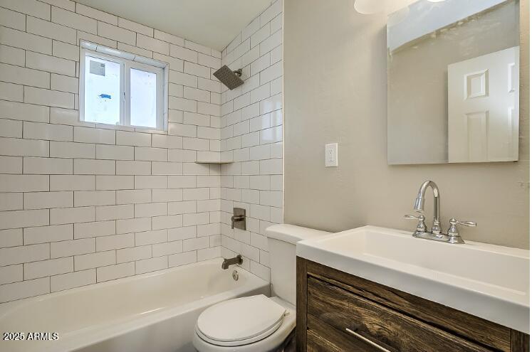 1231 North Oleander Street Tempe, AZ 85288 - Photo 6 of 10 a bathroom with a sink a toilet and shower