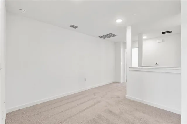 a kitchen with stainless steel appliances a stove refrigerator sink and microwave