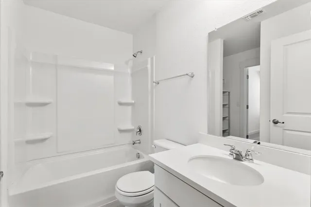 a utility room with washer and dryer