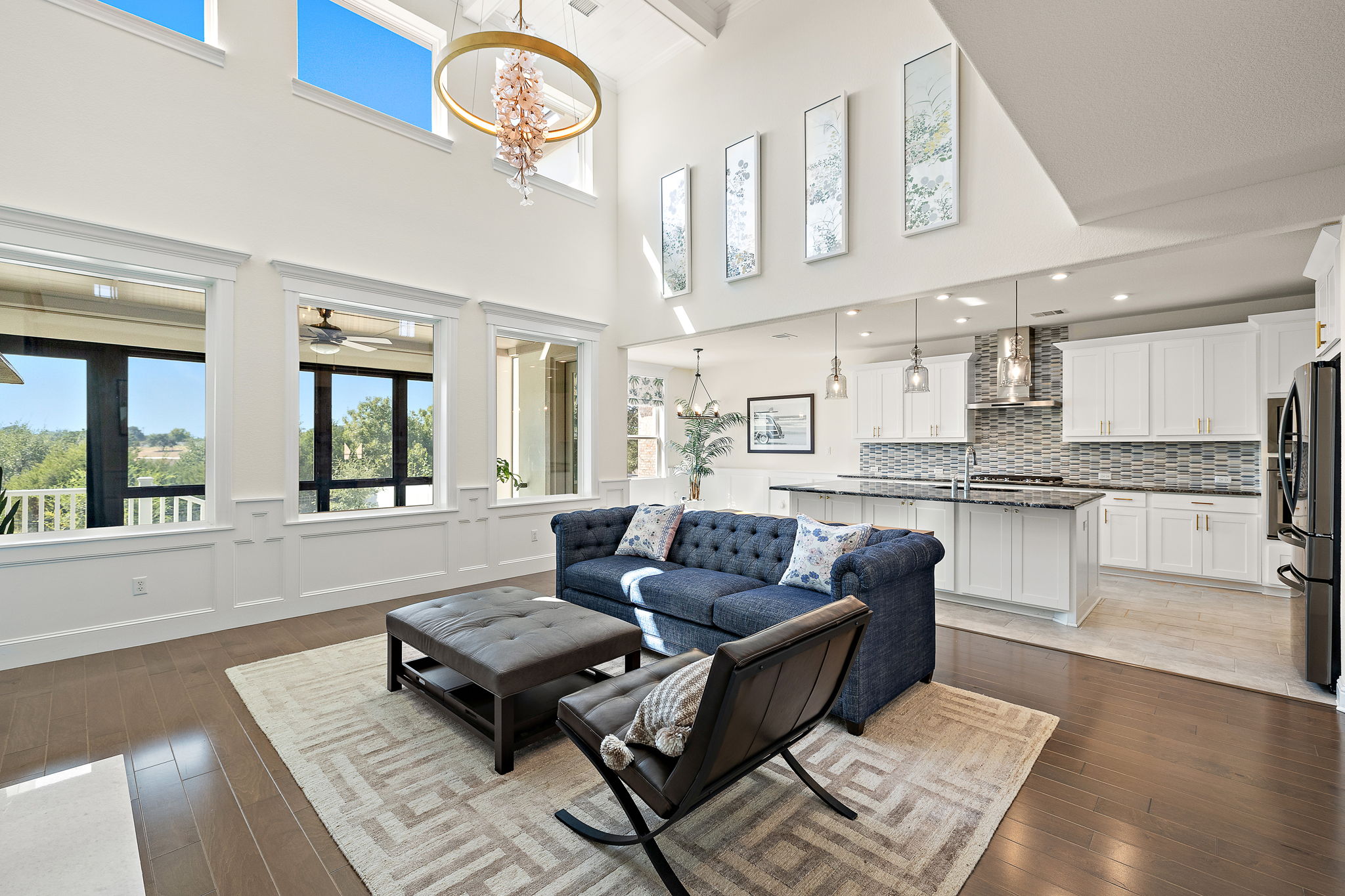 218 Encanto Place Austin, TX 78737 - Photo 17 of 40 a living room with furniture and kitchen view