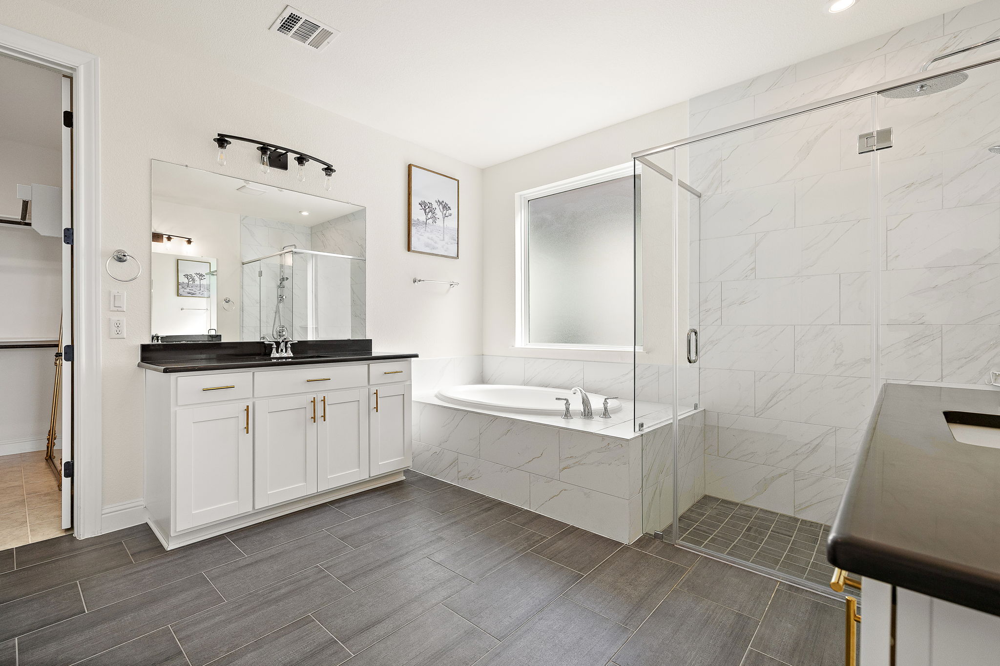 218 Encanto Place Austin, TX 78737 - Photo 22 of 40 a bathroom with a tub sink and mirror