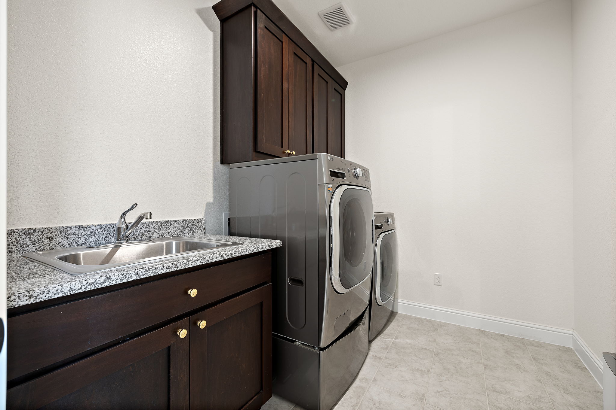 218 Encanto Place Austin, TX 78737 - Photo 25 of 40 a bathroom with a sink and a mirror