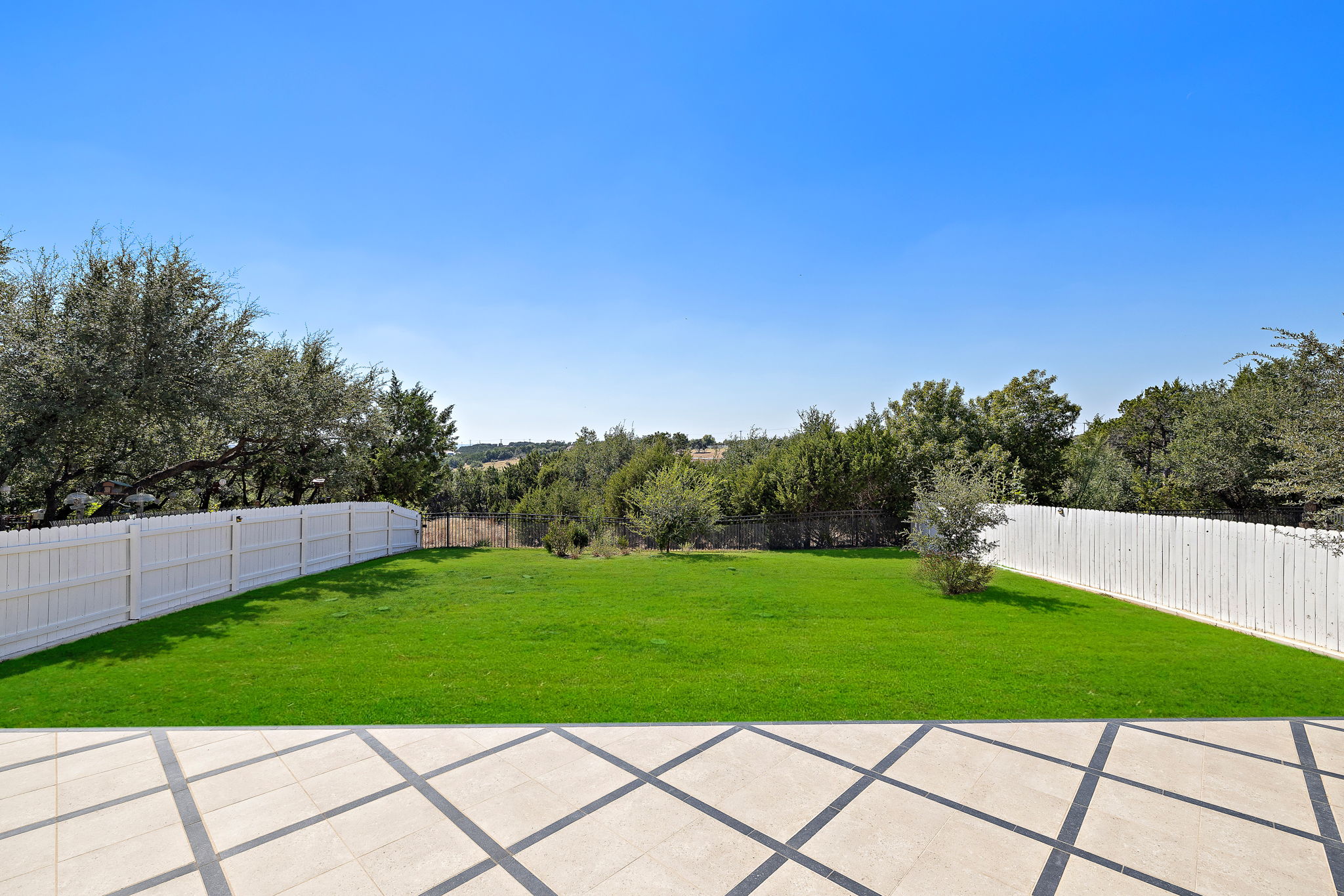 218 Encanto Place Austin, TX 78737 - Photo 36 of 39 a view of a yard and entertaining space
