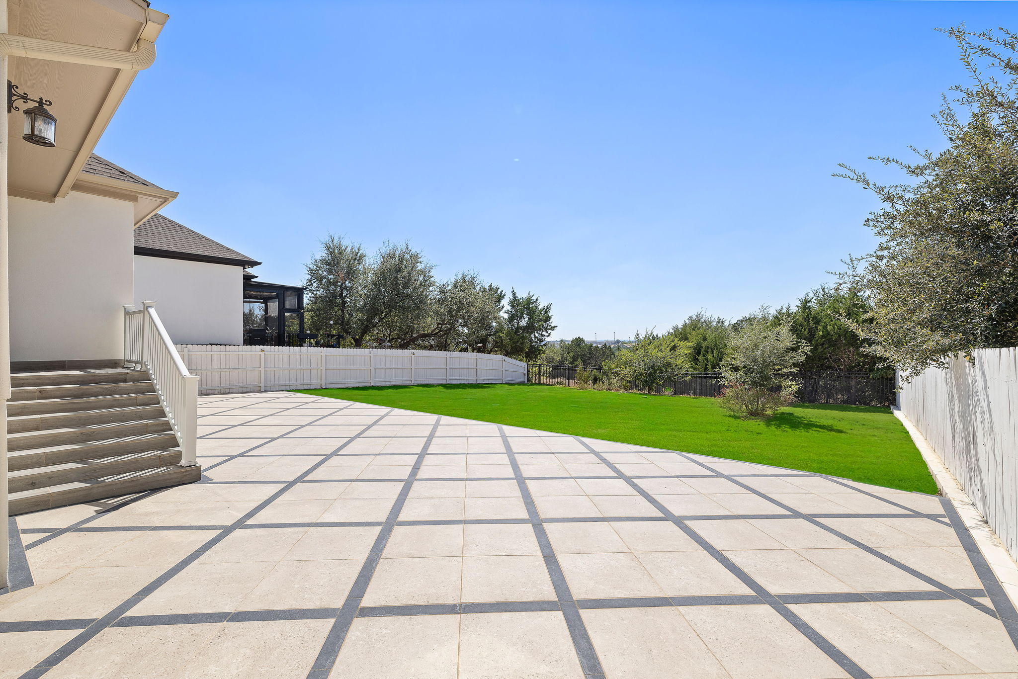 218 Encanto Place Austin, TX 78737 - Photo 38 of 40 a view of a backyard of the house