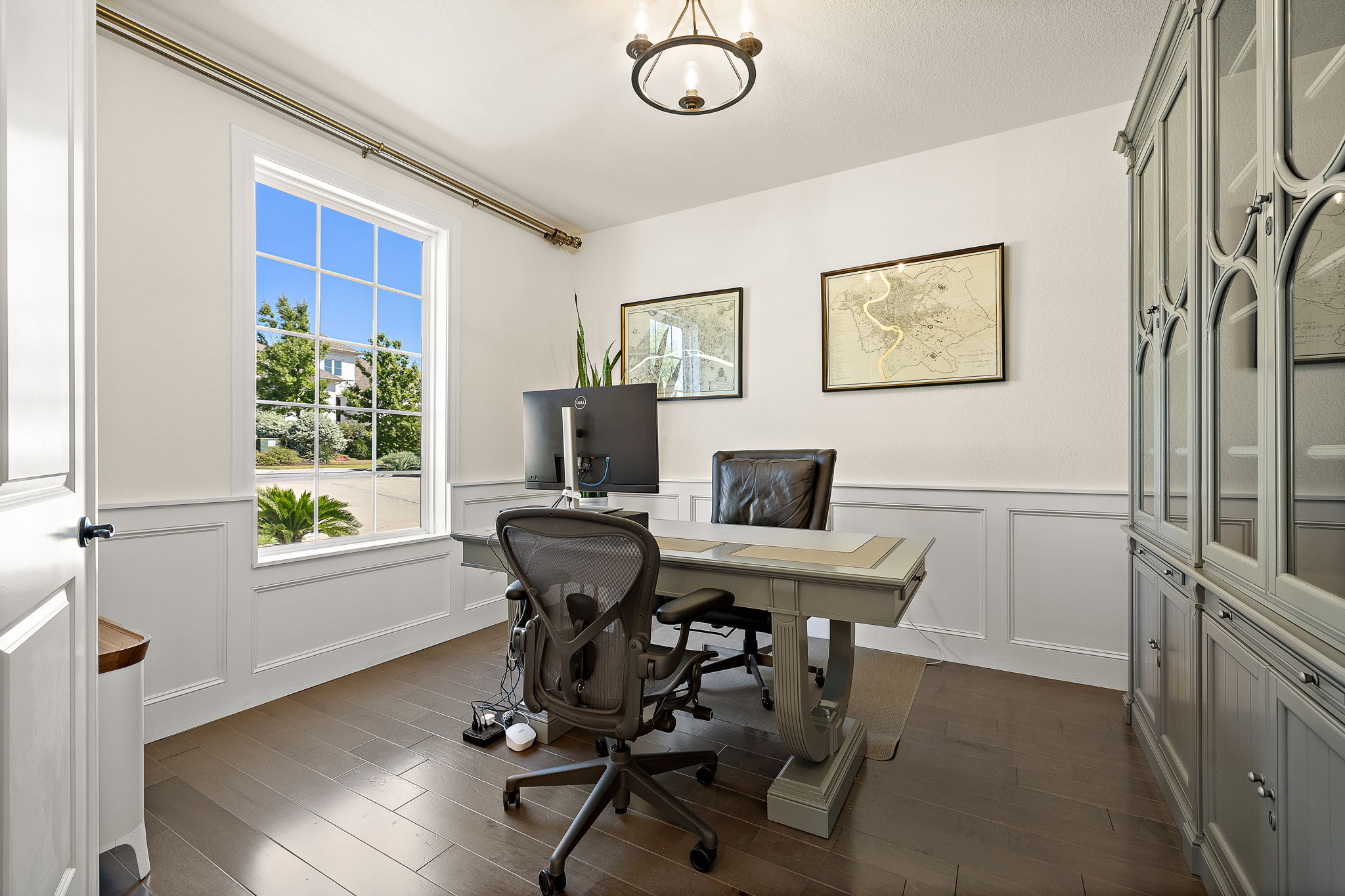 218 Encanto Place Austin, TX 78737 - Photo 6 of 40 a view of a workspace with furniture and a window